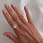 İrva Collection Tek Taş Yüzük with a prominent central gemstone and sleek silver band, showcasing elegant jewelry design.