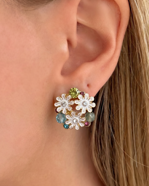 İrva Collection Papatya Küpe Mineli, gold-toned floral earrings with colorful enamel details, displayed close-up image.
