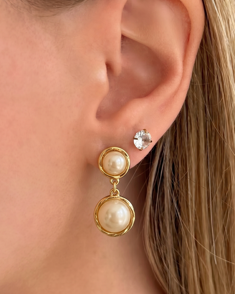 İrva Collection Haze Küpe, gold-toned dangling earrings with intricate design, displayed against a neutral background.