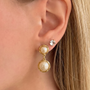 İrva Collection Haze Küpe, gold-toned dangling earrings with intricate design, displayed against a neutral background.
