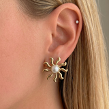 Silver clay earrings from İrva Collection featuring a sleek, modern design with a smooth, polished finish.