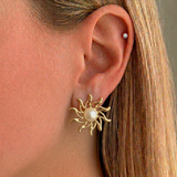 Lilac İrva Collection earrings featuring delicate lilac-colored design and silver hooks, showcasing elegant jewelry craftsmanship.