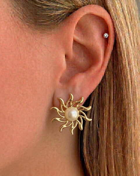 Lilac İrva Collection earrings featuring delicate lilac-colored design and silver hooks, showcasing elegant jewelry craftsmanship.