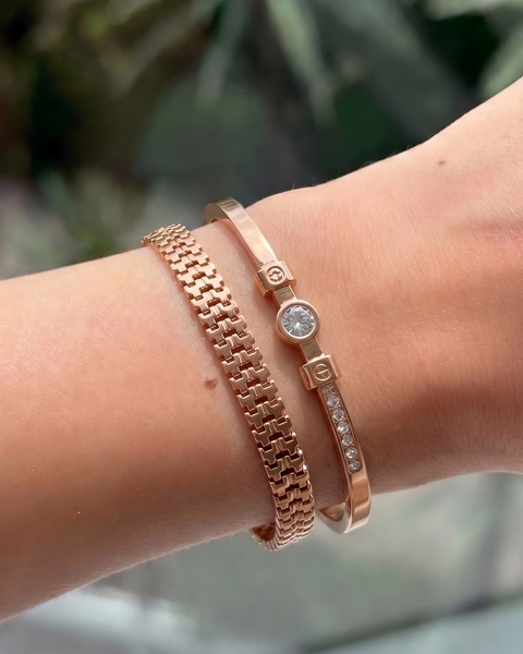 Pair of silver cuff bracelet set from İrva Collection, featuring sleek, minimalist design in a 2-piece set for stylish wear.