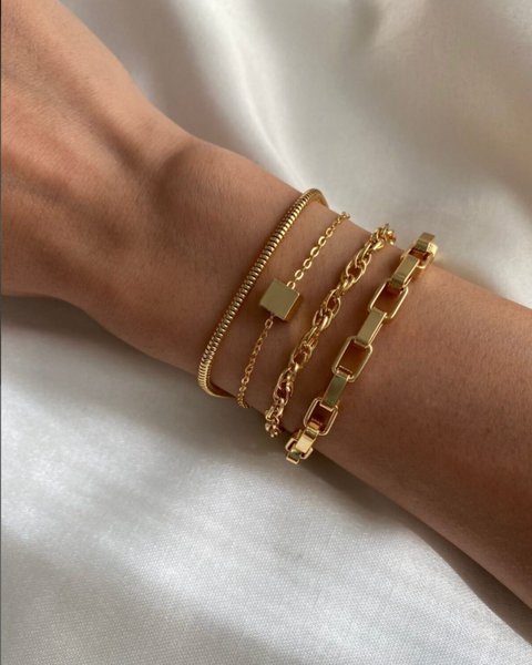 Four-piece cube bracelet chain set by İrva Collection featuring geometric cube links in silver tone.