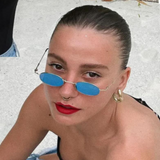 Serenay Sarıkaya inspired İrva Collection halka küpe with gold-tone finish and minimalist design, close-up of the stylish earrings.