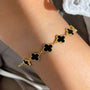 İrva Collection Kararmaz Mini Yonca Bileklik featuring a delicate gold-tone clover charm on a thin chain jewelry piece.