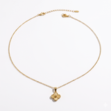Gold-plated minimalist Celtic clover necklace by İrva Collection featuring a delicate chain and detailed leaf pendant.