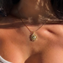 Gold Kararmaz Viral Güneş necklace by İrva Collection featuring a sun pendant on a delicate chain.