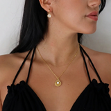 İrva Collection Sea Girl kolye featuring a delicate design with ocean-themed elements and a shimmering finish.
