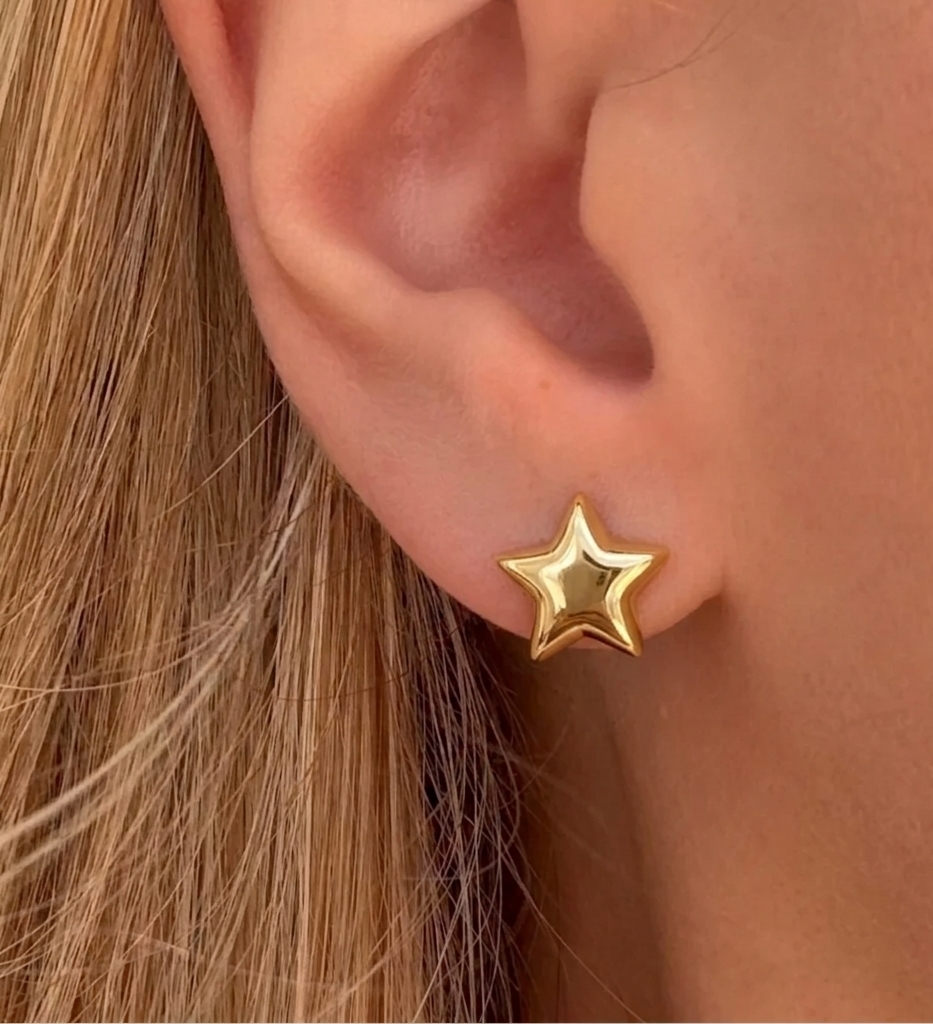 Silver I AM STAR hoop earrings by İrva Collection, featuring sleek steel design with star-shaped accents.