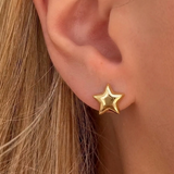 Silver I AM STAR hoop earrings by İrva Collection, featuring sleek steel design with star-shaped accents.
