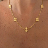 Gold VC necklace by İrva Collection featuring a sleek, minimalist design with a delicate chain and subtle pendant.
