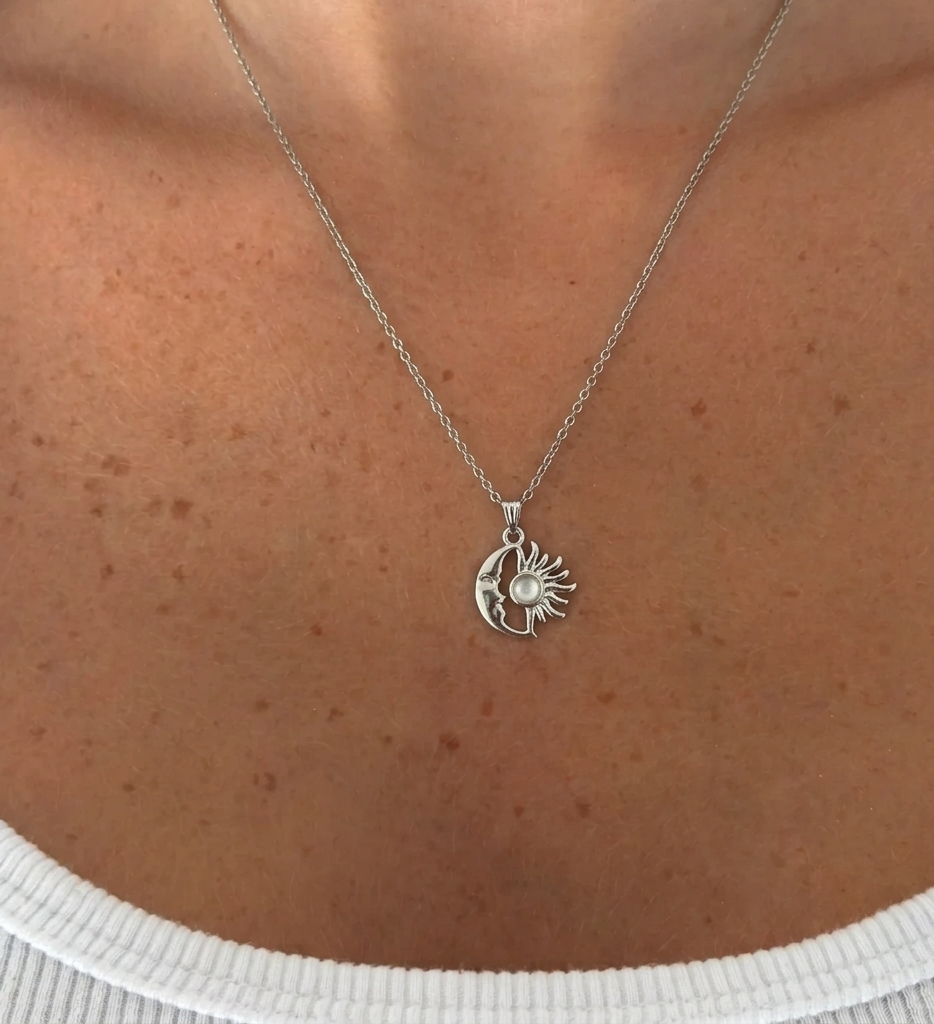Silver Beyaz Mineli Güneş kolye from İrva Collection featuring a sun pendant with a crescent moon design.