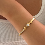 Silver gemstone bracelet by İrva Collection featuring sparkling stones and a sleek, elegant design.