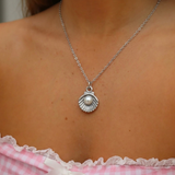 İrva Collection Sea Girl Kolye featuring a delicate ocean-themed pendant on a fine chain, showcased on a neutral background.