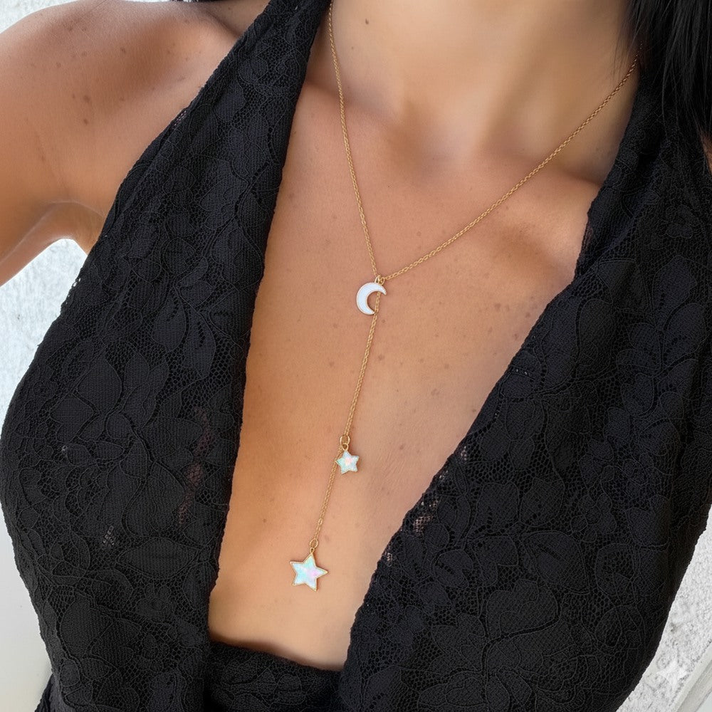Silver Y-shaped charm necklace with Gemini symbols, featuring intricate chain details from İrva Collection.