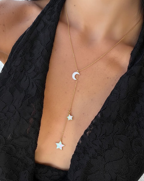 Silver Y-shaped charm necklace with Gemini symbols, featuring intricate chain details from İrva Collection.