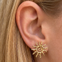 İrva Collection Güneş Küpe featuring a stylish sun-inspired design, gold-tone finish, and intricate detailing for a chic look.