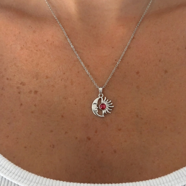 Silver Beyaz Mineli Güneş Kolye with delicate sun pendant from İrva Collection on a chain.
