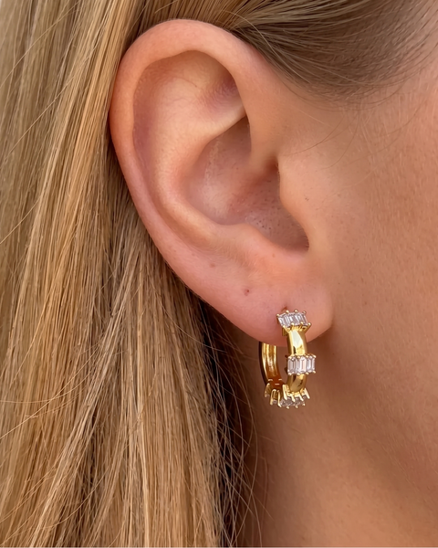Silver Vip Taşlı Küpe by İrva Collection featuring sparkling gemstones and a stylish, modern design.