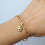Irva Collection Papatya Charm bracelet featuring delicate flower charms on a silver chain, stylish and lightweight jewelry.