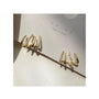 İrva Collection Zirkon Taşlı Pençe Küpe with gold plating, featuring a claw design and sparkling zircon stones.